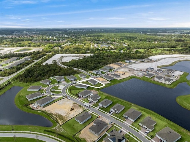 aerial view with a water view and a residential view