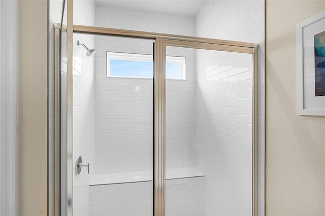 bathroom with a stall shower