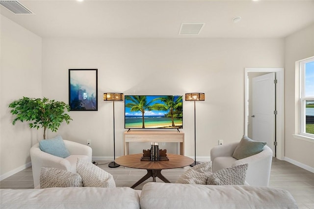 4385 Lago Cir, Vero Beach, FL 32967 - tiled living area with baseboards and recessed lighting