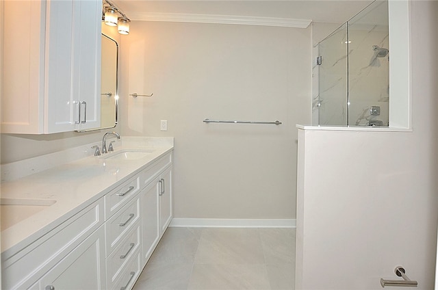 bathroom featuring tile patterned floors, vanity, ornamental molding, and tiled shower