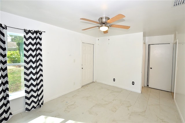 empty room with ceiling fan