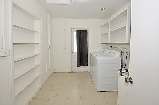 laundry area with washer and clothes dryer