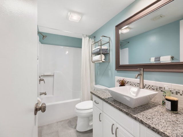 full bathroom with toilet, shower / tub combo, backsplash, and vanity