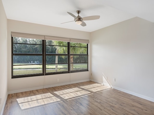 unfurnished room with light wood-type flooring and ceiling fan