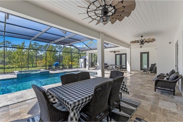 view of swimming pool with french doors, a patio, ceiling fan, and an in ground hot tub