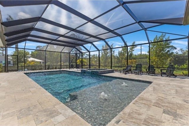 view of pool with an in ground hot tub, a lanai, and a patio