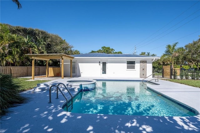 view of pool with a patio, an in ground hot tub, and a pergola