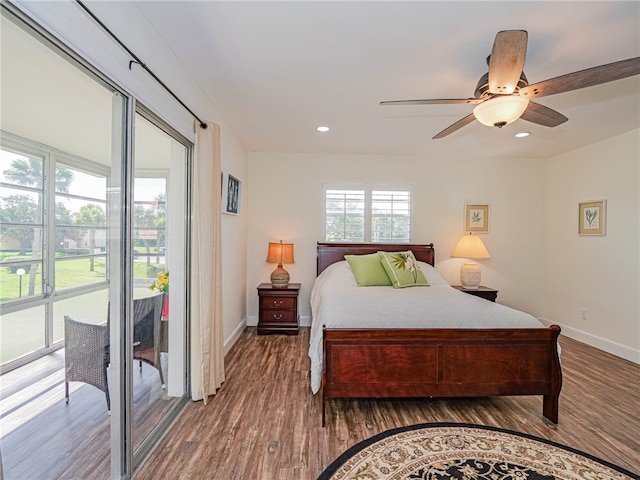 bedroom with access to exterior, hardwood / wood-style flooring, and ceiling fan