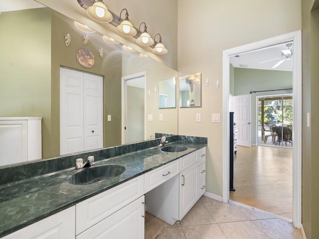 77 Joy Haven Dr, Sebastian, FL 32958 - bathroom featuring double vanity, ceiling fan, and tile patterned floors
