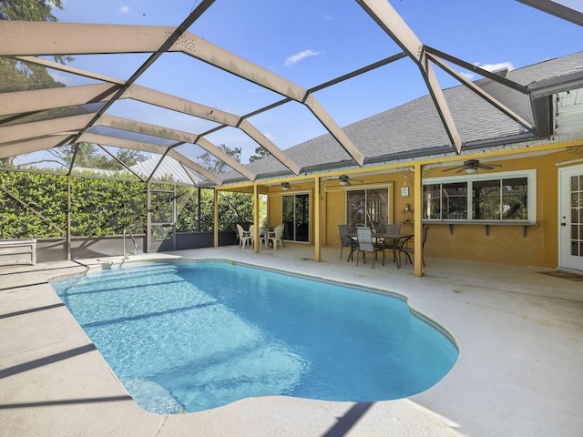 77 Joy Haven Dr, Sebastian, FL 32958 - outdoor pool with ceiling fan, outdoor dining area, a patio area, and a lanai