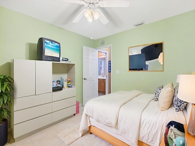 77 Joy Haven Dr, Sebastian, FL 32958 - bedroom featuring light tile patterned floors and a ceiling fan