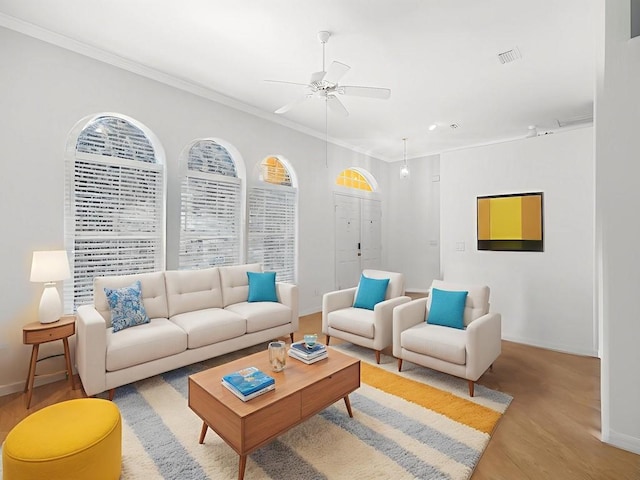 77 Joy Haven Dr, Sebastian, FL 32958 - living room with ceiling fan, light wood-type flooring, and ornamental molding