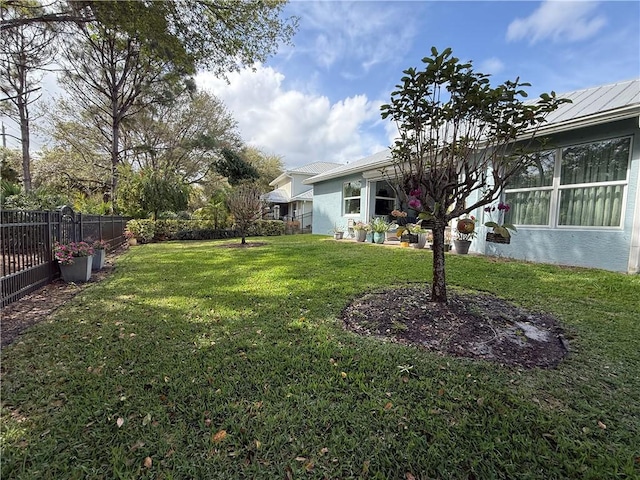 view of yard with fence