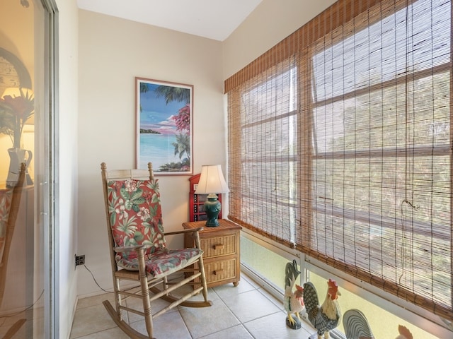 sitting room featuring light tile patterned floors