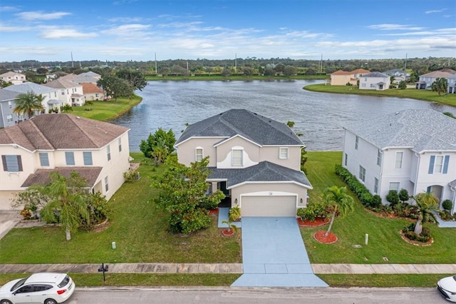 drone / aerial view featuring a water view