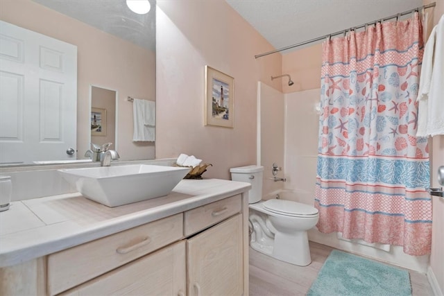 full bathroom with vanity, toilet, shower / bathtub combination with curtain, and hardwood / wood-style flooring