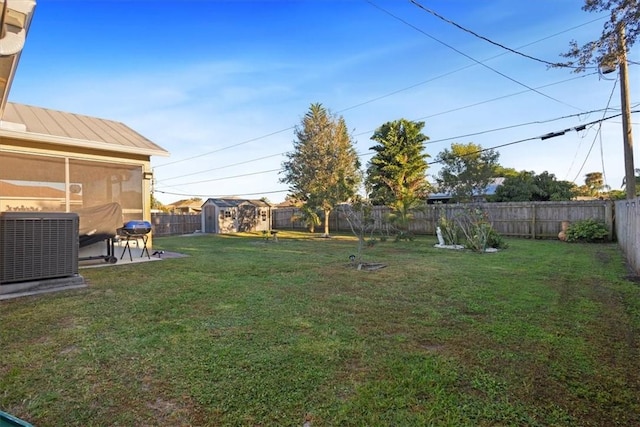 view of yard featuring central AC unit