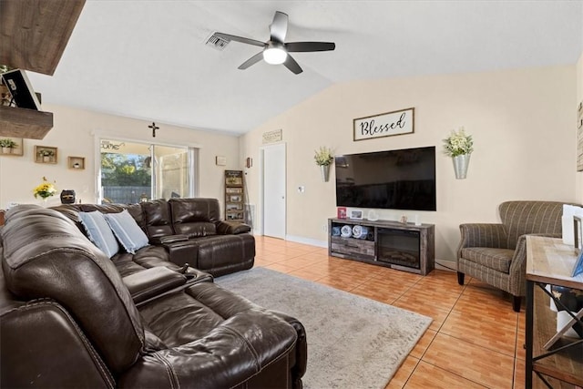 living room with tile patterned floors, ceiling fan, and lofted ceiling