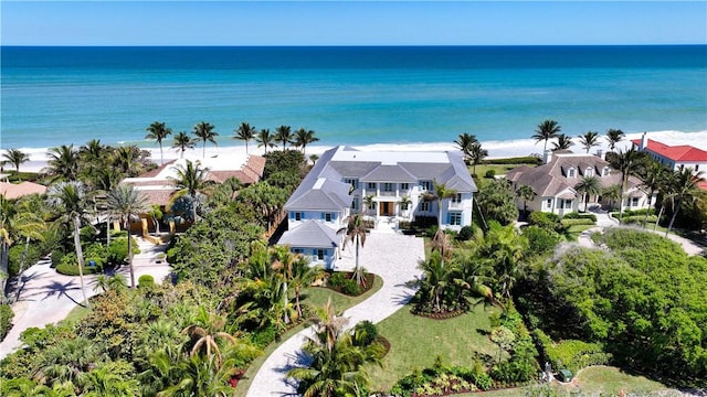 drone / aerial view with a residential view and a water view