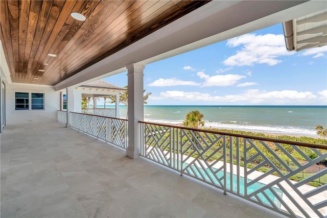330 N Blue Wave Ln, Vero Beach, FL 32963 - balcony with a water view and a beach view