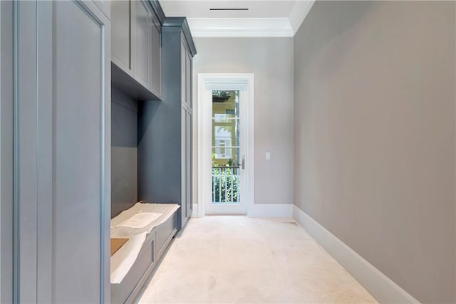 330 N Blue Wave Ln, Vero Beach, FL 32963 - mudroom with light colored carpet, crown molding, and baseboards