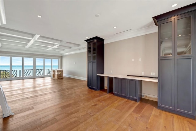 330 N Blue Wave Ln, Vero Beach, FL 32963 - unfurnished living room featuring coffered ceiling, beam ceiling, baseboards, light wood-style floors, and recessed lighting