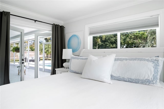 bedroom featuring french doors, access to exterior, and crown molding