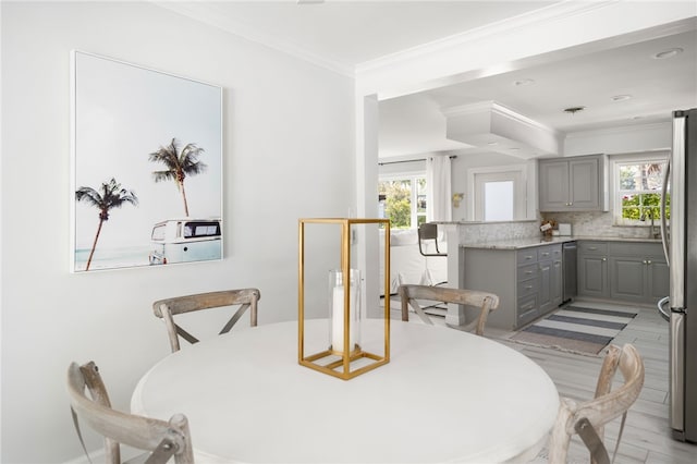 dining room with crown molding