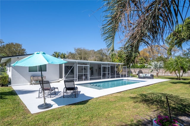 view of pool with a patio, a fenced in pool, fence, a sunroom, and a lawn