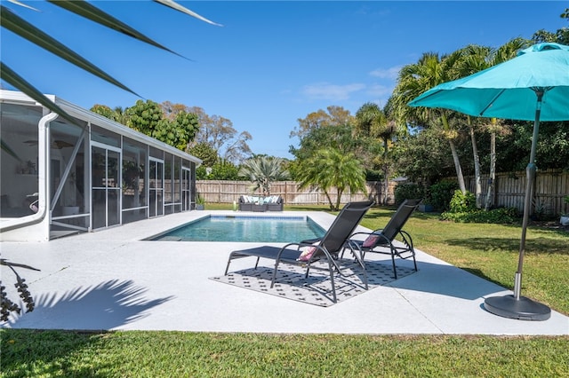 view of swimming pool featuring a fenced in pool, a sunroom, a yard, a fenced backyard, and a patio