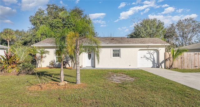 ranch-style home featuring a front yard and a garage