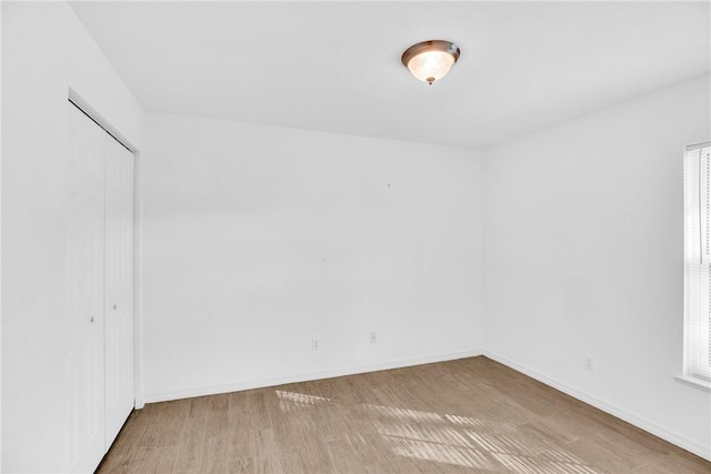 empty room featuring light hardwood / wood-style floors