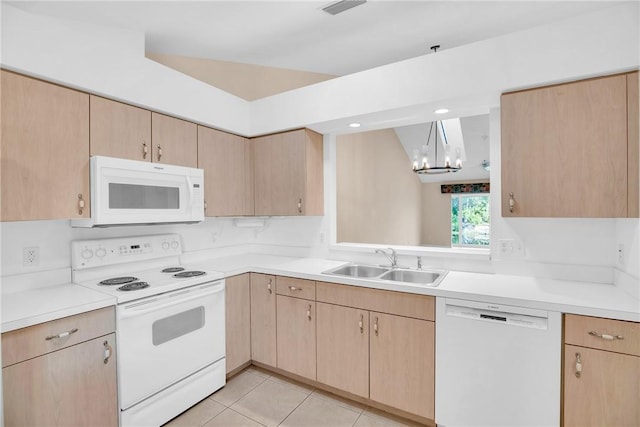 kitchen featuring sink, hanging light fixtures, light tile patterned floors, light brown cabinets, and white appliances