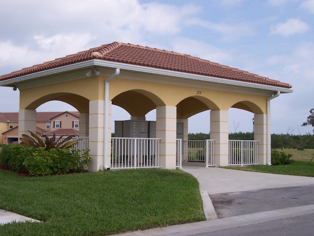 view of home's community with a lawn