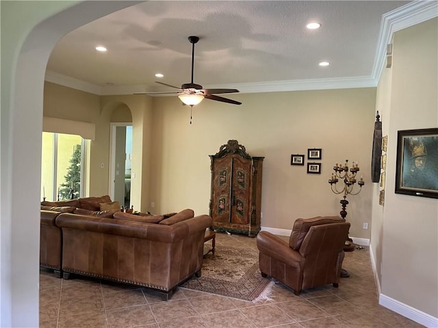 7633 Fieldstone Ranch Sq, Vero Beach, FL 32967 - living area with ornamental molding, arched walkways, a ceiling fan, recessed lighting, and tile patterned flooring