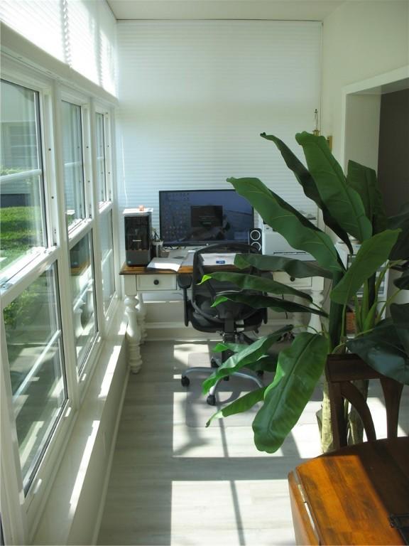 office area with light hardwood / wood-style floors