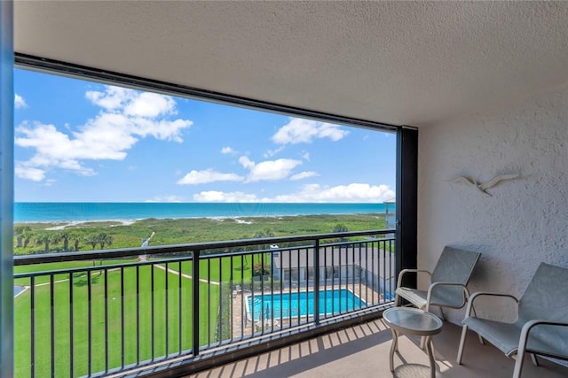 1480 Ocean Dr Unit 4C, Vero Beach, FL 32963 - balcony with a water view and view of pool