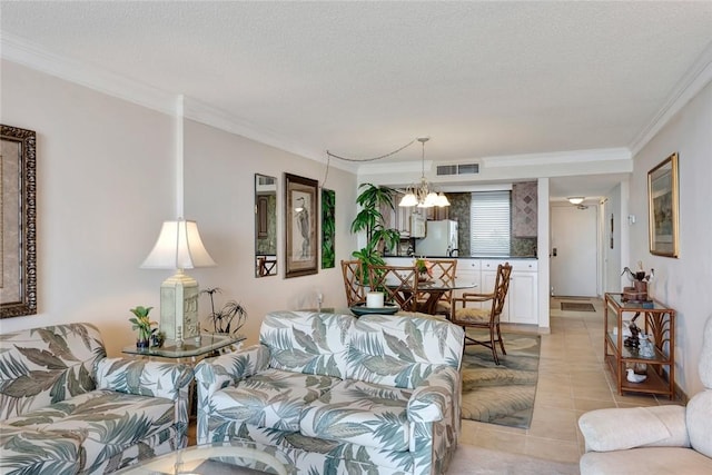 1480 Ocean Dr Unit 4C, Vero Beach, FL 32963 - living area featuring ornamental molding, a chandelier, and light tile patterned floors