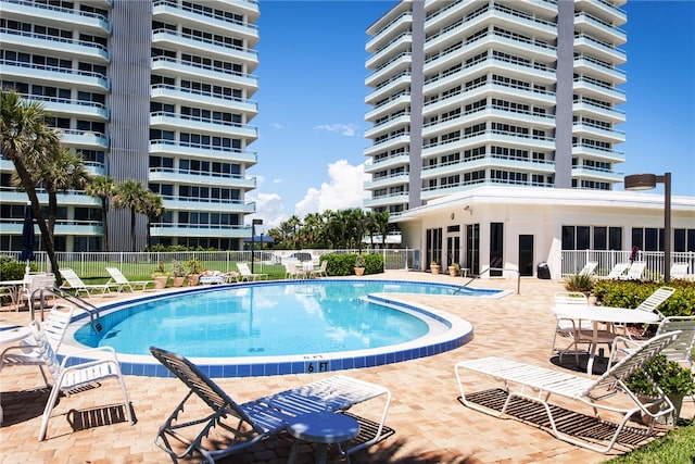 view of pool featuring a patio