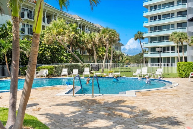 view of pool featuring a patio area