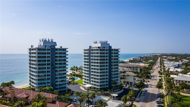 drone / aerial view with a water view