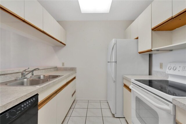 kitchen featuring sink, black dishwasher, white range with electric stovetop, light tile patterned flooring, and white cabinetry