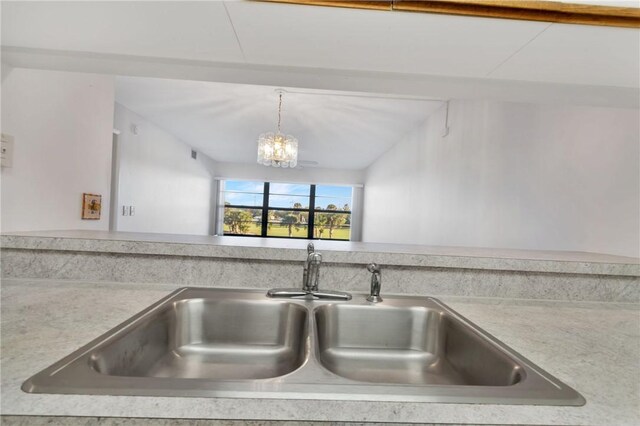 carpeted spare room featuring a water view and ceiling fan