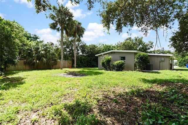 view of yard with central AC