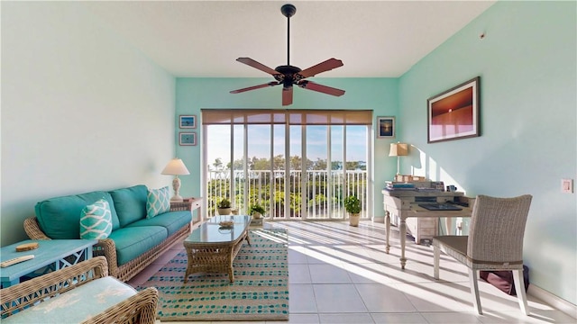 living room with tile patterned flooring and ceiling fan