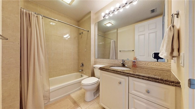 full bathroom with shower / bathtub combination with curtain, tile patterned floors, toilet, and vanity