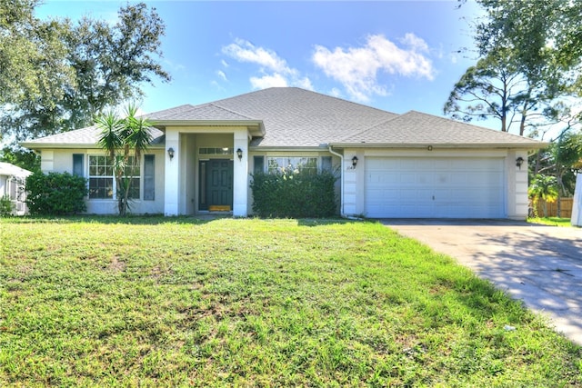 ranch-style house featuring a front lawn and a garage