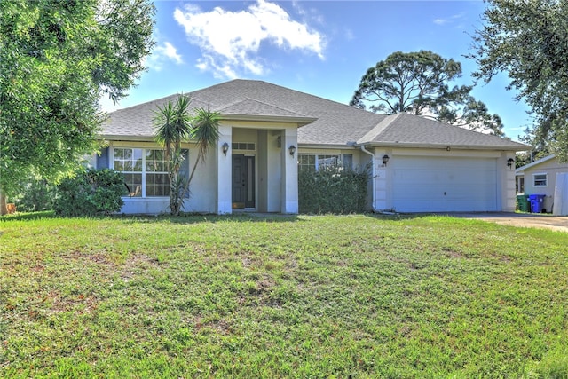 single story home with a garage and a front yard