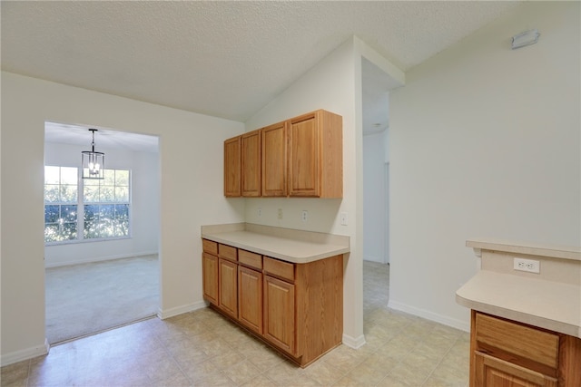 kitchen with light carpet, a textured ceiling, lofted ceiling, a notable chandelier, and pendant lighting