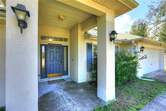 property entrance featuring a garage